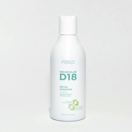 Un flacon blanc de Shampoing Detox D18 300ml - Couleur Dahlia avec un texte vert est présenté sur un fond clair. Dahlia Color Professionnel