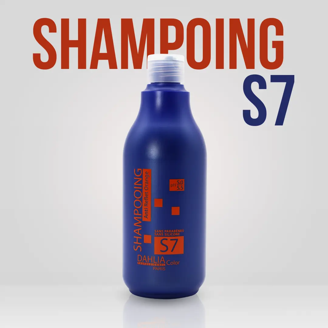 Flacon bleu de Shampoing Anti Reflet Orange S7 500ml avec texte orange "SHAMPOOING S7" sur fond blanc. Ce shampoing professionnel pas cher offre un excellent rapport qualité/prix pour vos cheveux. Dahlia Color Professionnel